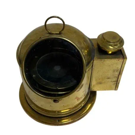 vintage marine compass in brass housing with gimbal base