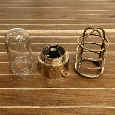 Pauluhn Brass Nautical Caged Ceiling Light (2) Pauluhn brass nautical ceiling light disassembled to show socket and globe parts