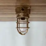 Short Cage Red Brass Ceiling Light installed on ceiling