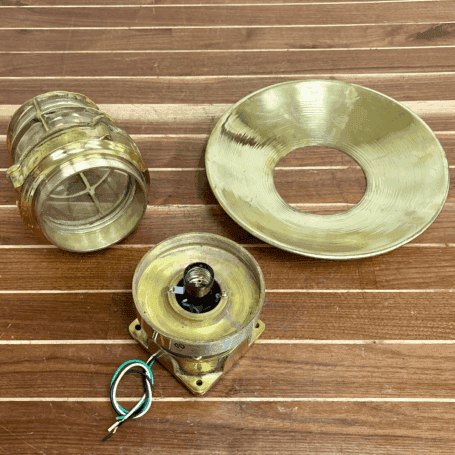 Solid Brass Marine Ceiling Light (7) Brass ceiling light taken apart to show globe, cage, and rain cap components.