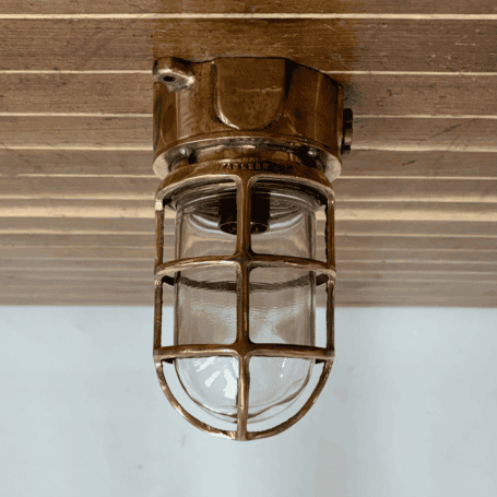 Tall Cage Red Brass Ceiling Light (8) Tall Cage Red Brass Ceiling Light installed on ceiling panel