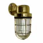 Vintage marine wall sconce with thick brass base mounted on wall