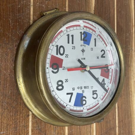 Vintage Polaris Brass Ship Clock (Non-Working) 04 Angled view of vintage Polaris brass ship clock with radio silence markings