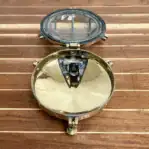 Open brass light fixture showing bulb socket