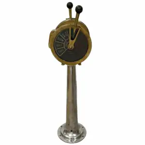 Opposite face view of brass and aluminum ship telegraph