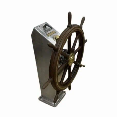 Angled view of marine steering wheel display with brass center hub