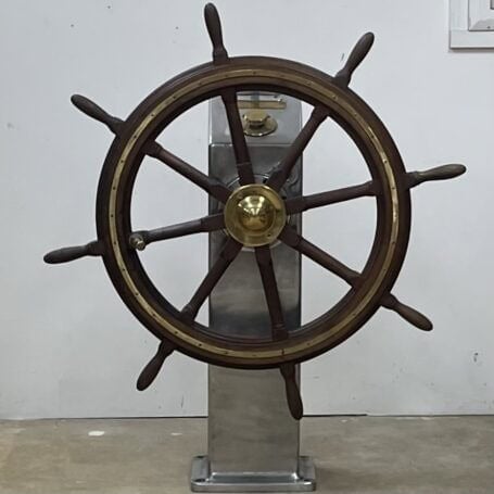 Marine Steering Wheel Display with Brass Center - STORK-JAFFA Electric Helm Front view of full vintage ship wheel mounted on base