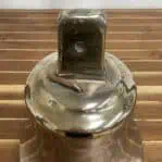 Mounting bracket and patina on brass ship bell top