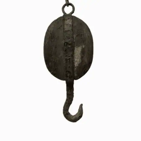 Great Lakes salvaged wood ship pulley with iron hook – front view