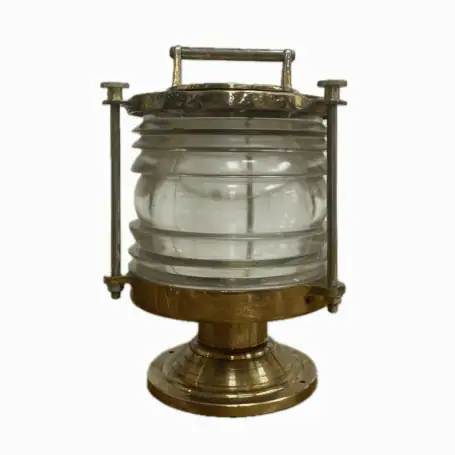 Cutout photo of vintage marine Fresnel light on white background