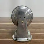 Back view of vintage aluminum nautical bulkhead light – salvaged ship fixture
