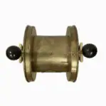 Top-down view of telegraph housing showing black knobs and brass finish