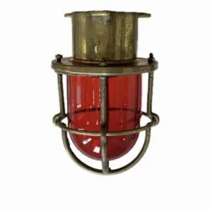 Close-up of nautical red glass cage light fixture