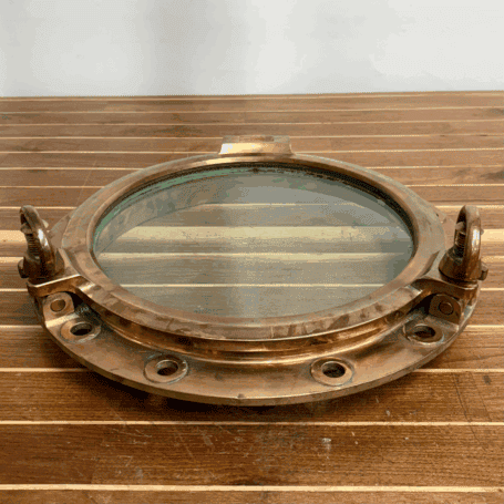 Large Vintage Red Brass Porthole with Asymmetrical Inset (6) Large Vintage Red Brass Porthole with Asymmetrical Inset – Dog Detail