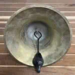 salvaged nautical brass bell interior showing original clapper attached