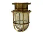 vintage brass marine light fixture with cage and glass globe