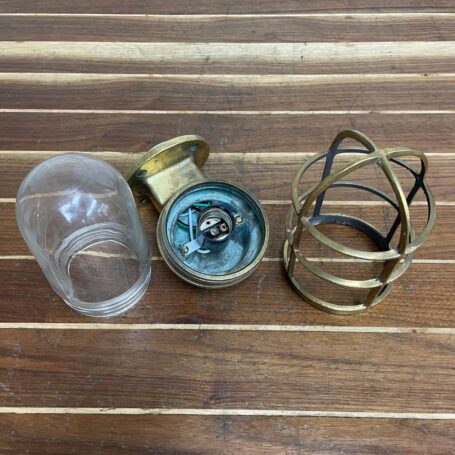 Brass Nautical Wall Light with Cage and Glass Globe 06 disassembled brass wall light with glass globe and cage components