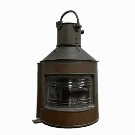 Front view of nautical copper lantern with clear lens and red insert visible