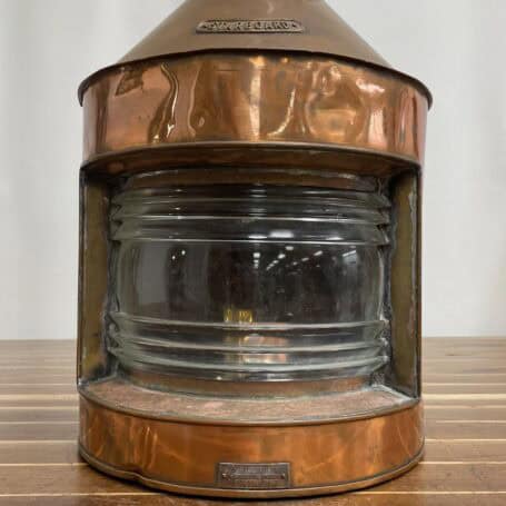 Vintage Copper Ship Lantern - Starboard Fresnel Light with Original Oil Chamber Front view of vintage copper ship lantern showing clear Fresnel lens and copper patina