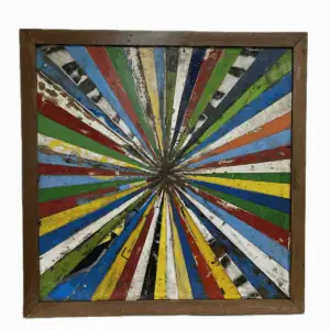 Reclaimed boat wood wall art with green, red, and black accents in a starburst pattern