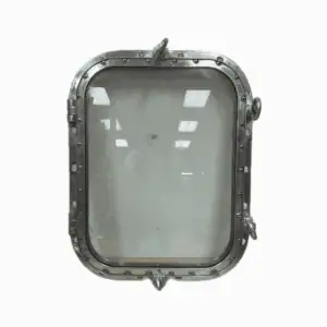 Close-up of salvaged four dog aluminum porthole standing upright