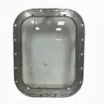 Backside view of four dog aluminum porthole showing mounting holes