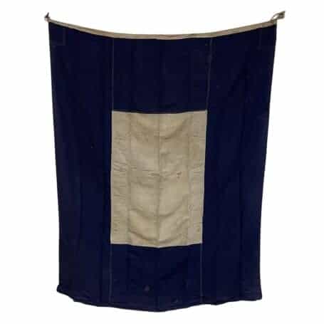 Salvaged Papa Nautical Signal Flag 04 Nautical signal flag full view showing worn fabric, discoloration, and original grommets