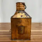 Vintage Copper Fresnel Lens Ship Lantern showing mounting bracket detail