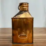 Side view of copper and brass ship lantern with top handle