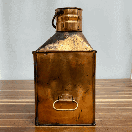 Vintage Copper Fresnel Lens Ship Lantern (6) Side view of copper and brass ship lantern with top handle