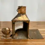 Interior view of Vintage Copper Fresnel Lens Ship Lantern with open access door