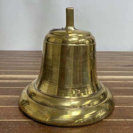 Authentic Brass Ship Bell - Yeoman Burn Oslo 1991 03 Side view of vintage brass ship bell with visible wear and patina