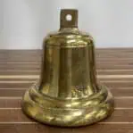Back view of brass ship bell from Norwegian bulk carrier Yeoman Burn