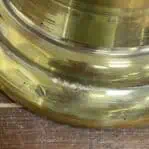 Detail of corrosion and wear on base