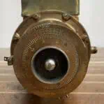 Close-up of vintage microamperes meter frequency dial with engraved markings