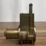 Vintage microamperes meter side profile with attached lever and fittings