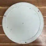 Vintage seafoam green aneroid barometer back housing with visible surface wear