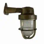 Wall-mounted brass sconce from ship salvage