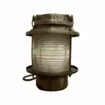 Vintage ship lantern with brass housing and clear Fresnel lens