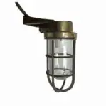 Side view of mounted brass nautical wall sconce against white