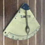Vintage brass clinometer salvaged from a marine vessel