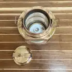 Open top showing ceramic socket and interior