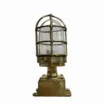 white background with brass light mounted