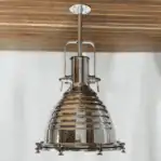 Large Aluminum Nautical Pendant Light with brass accents hanging from ceiling