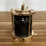 Marine light with grey plastic Fresnel lens close-up