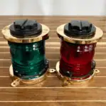 PERKO Brass Navigation Light Set angled view on wood surface