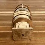 Bottom view fixture showing where wiring would exit and base