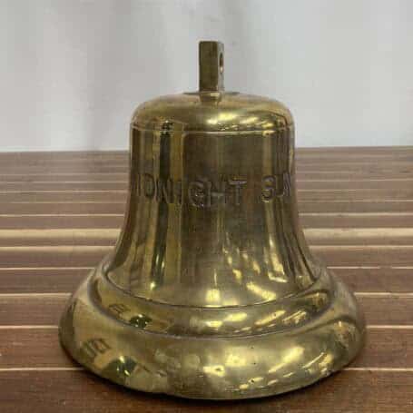 Salvaged Brass Ship Bell from MIDNIGHT SUN - 12” Diameter, 22 lbs. 05 Salvaged brass ship bell close-up of MIDNIGHT SUN lettering and surface scratches