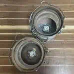 Interior socket view of rewired brass navigation lights from top-down