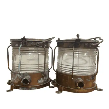 Top-down image of antique brass lanterns with aged metal finish
